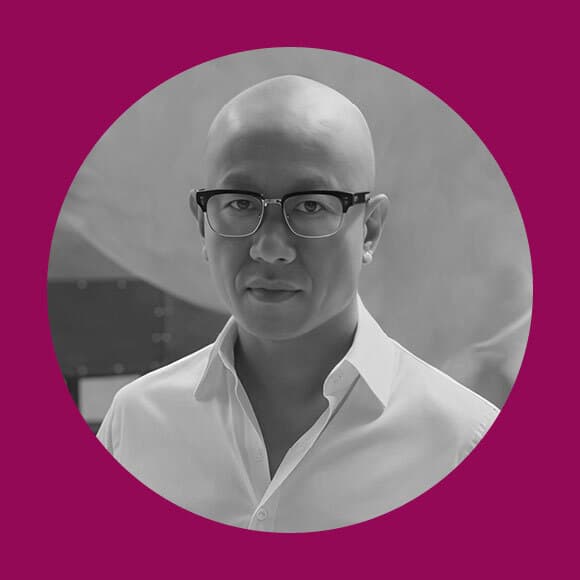 Magenta background with a black and white headshot photograph of Liu Wei wearing a white shirt and glasses.