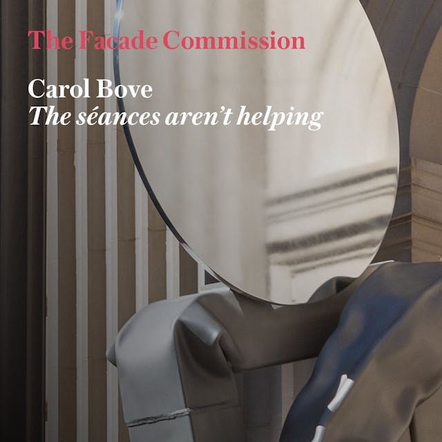 A large steel abstract sculpture in front of the facade of The Met Fifth Avenue. Text: "The Facade Commission Carol Bove The seances aren't helping"