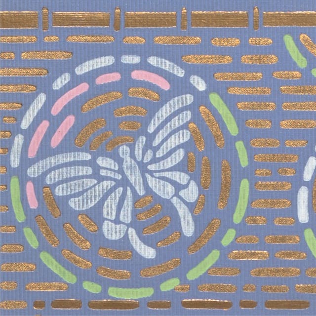 Close up of butterfly and decorative elements on book cover.