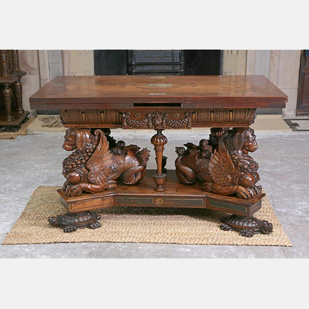Intricately carved wooden "Sea Dog" table