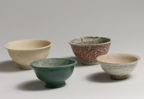 Four monochrome bowls