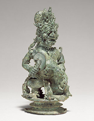 Top of a Bell in the form of a demon king or guardian