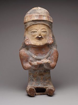 Figure Holding Child