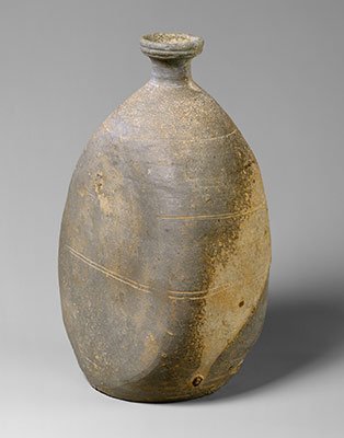 Bottle with flattened side