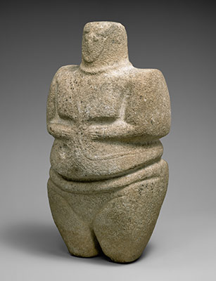 Standing female figure wearing a strap and a necklace