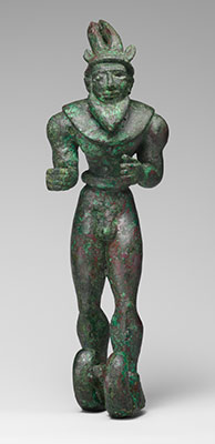 Striding figure with ibex horns, a raptor skin draped around the shoulders, and upturned boots