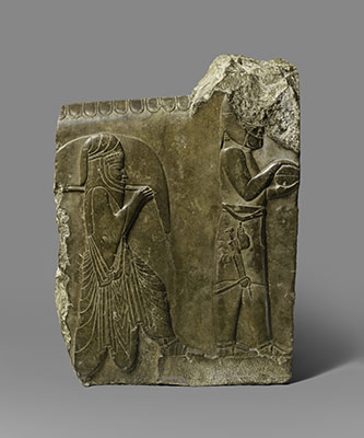 Relief: two servants bearing food and drink