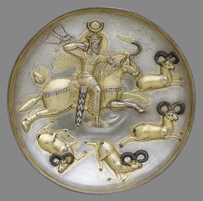 Plate with king hunting rams