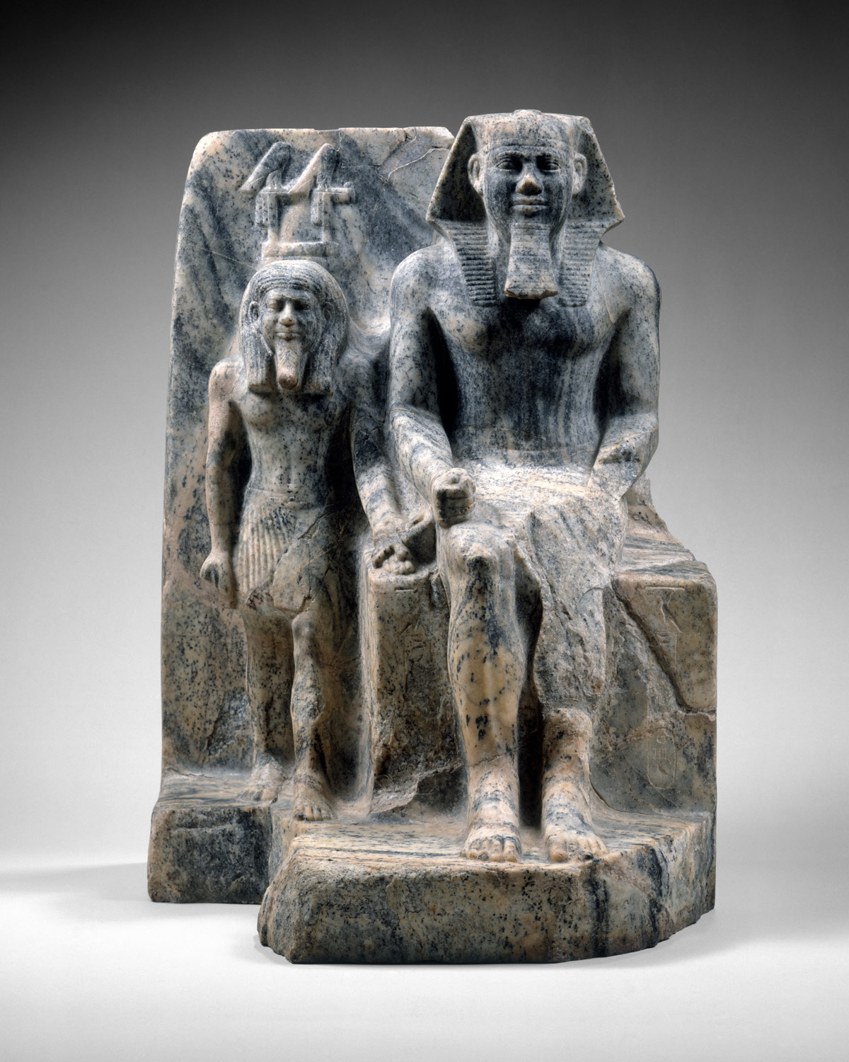 King Sahure and a nome god