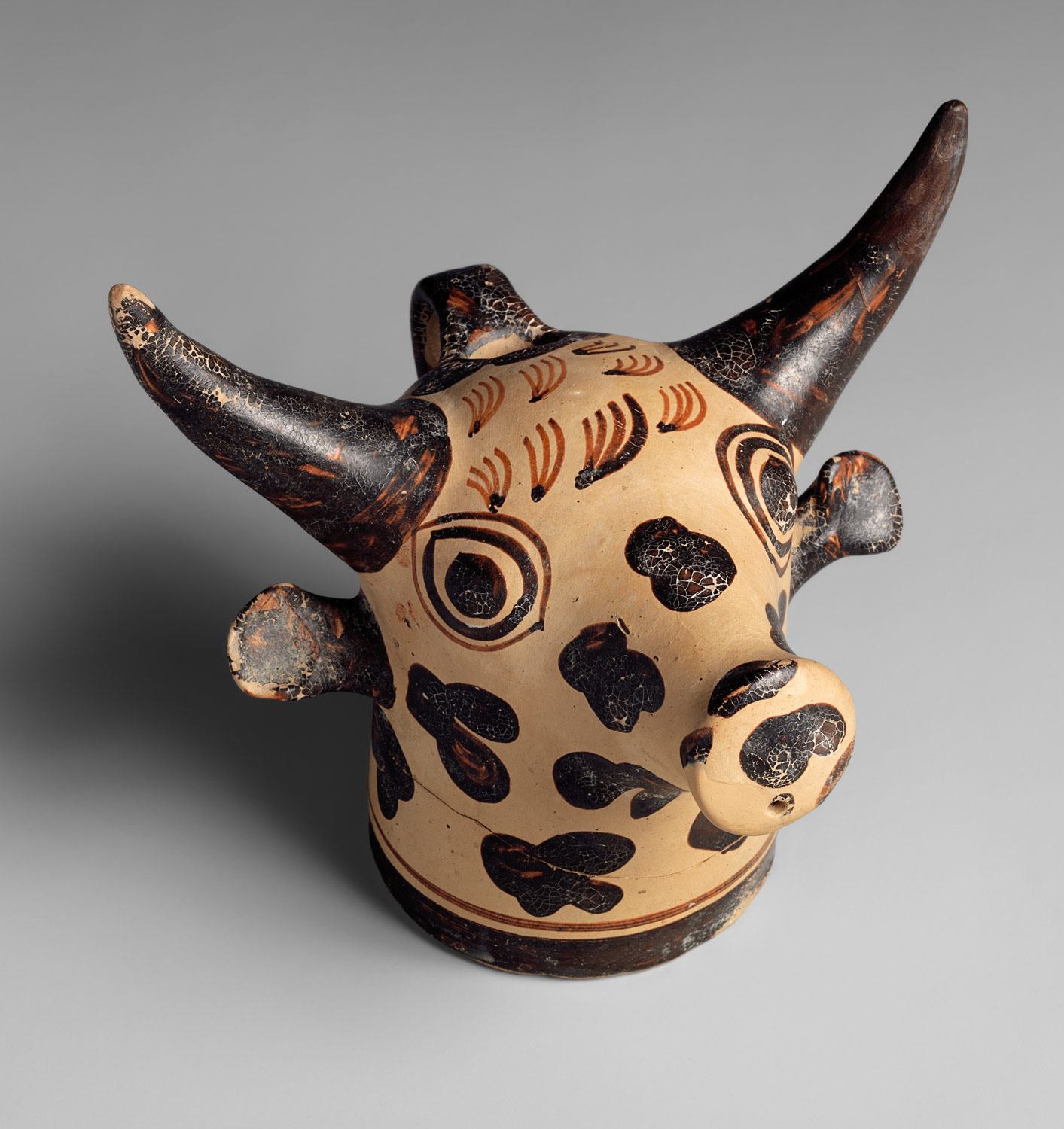 Terracotta vase in the form of a bulls head