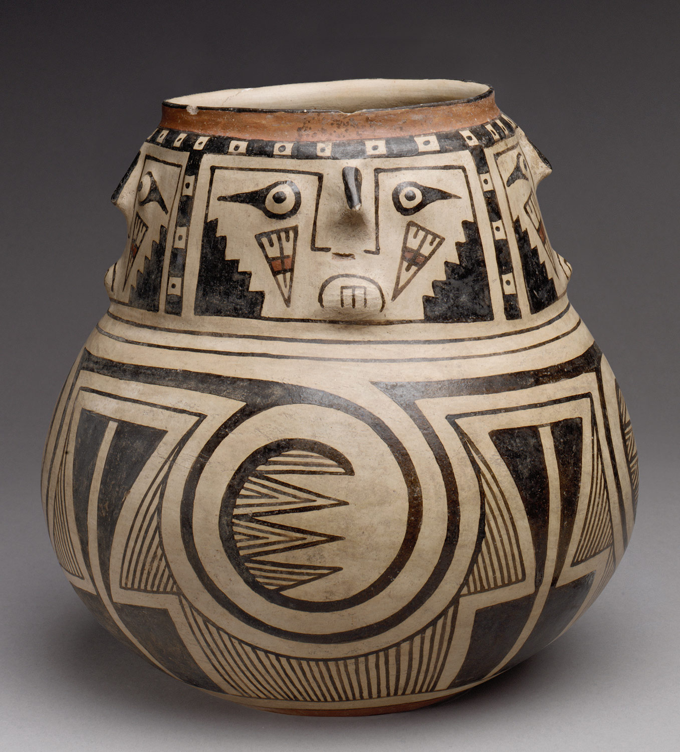 Jar with Four Faces