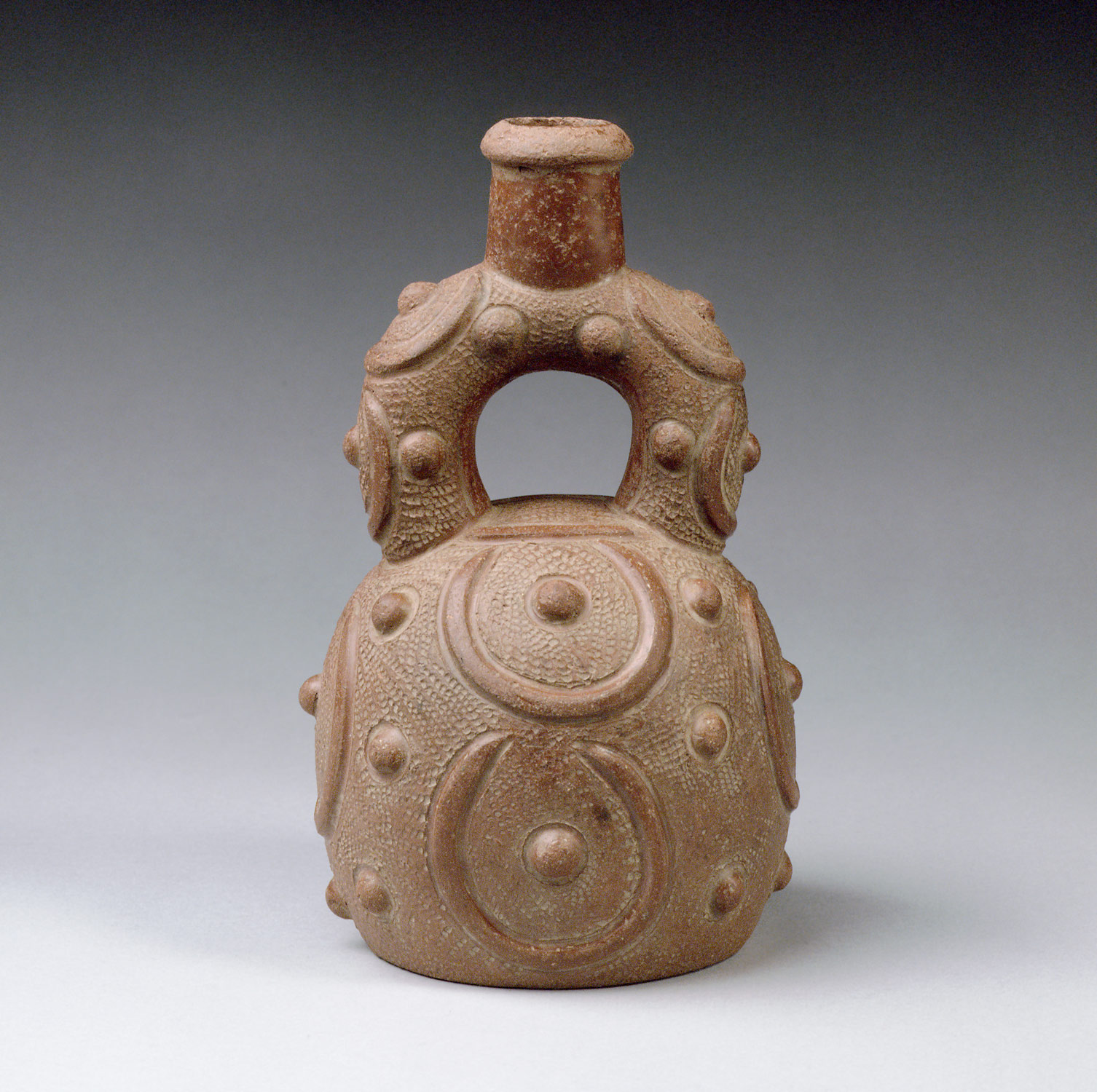 Stirrup-Spout Bottle