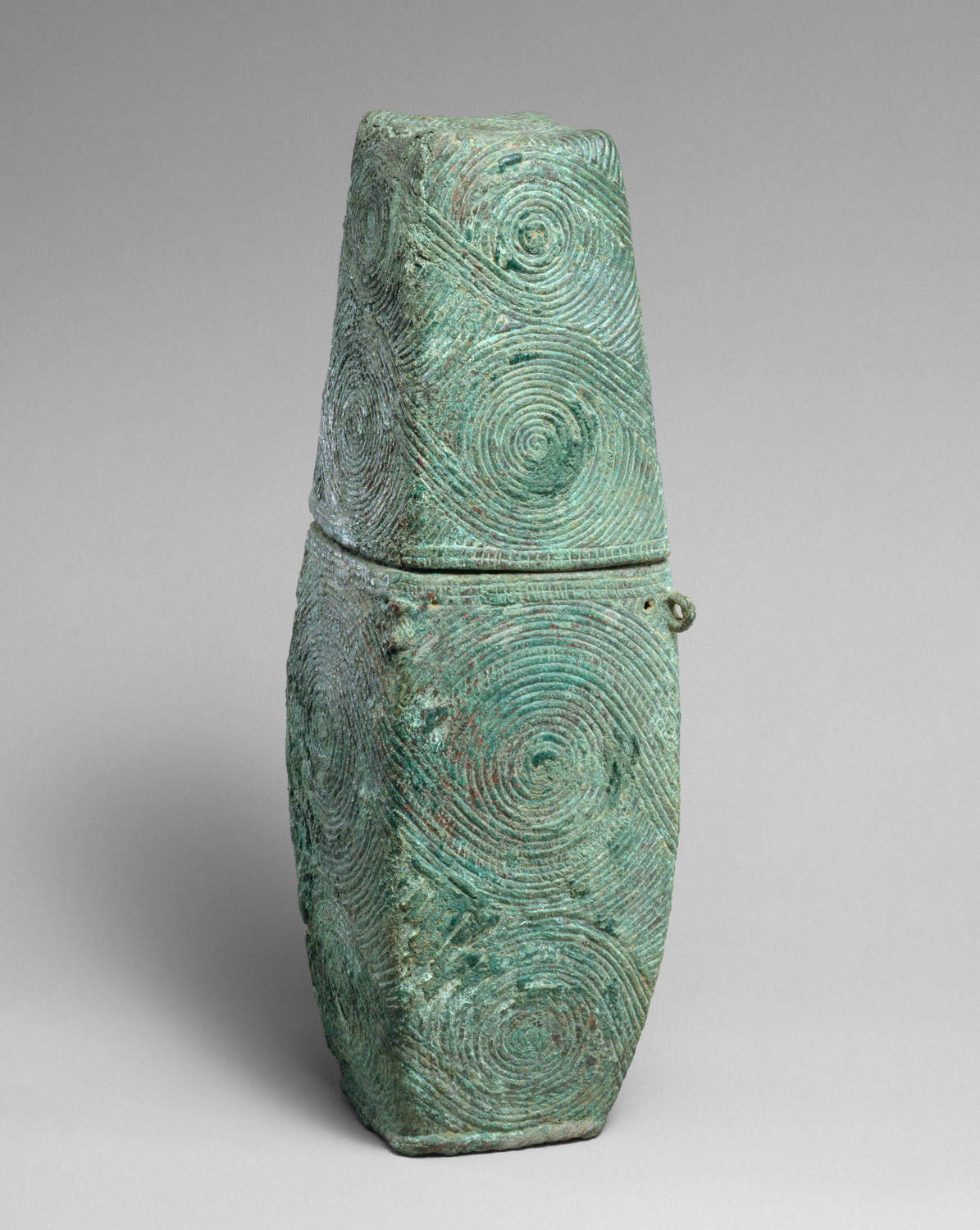 Container with spiral decoration