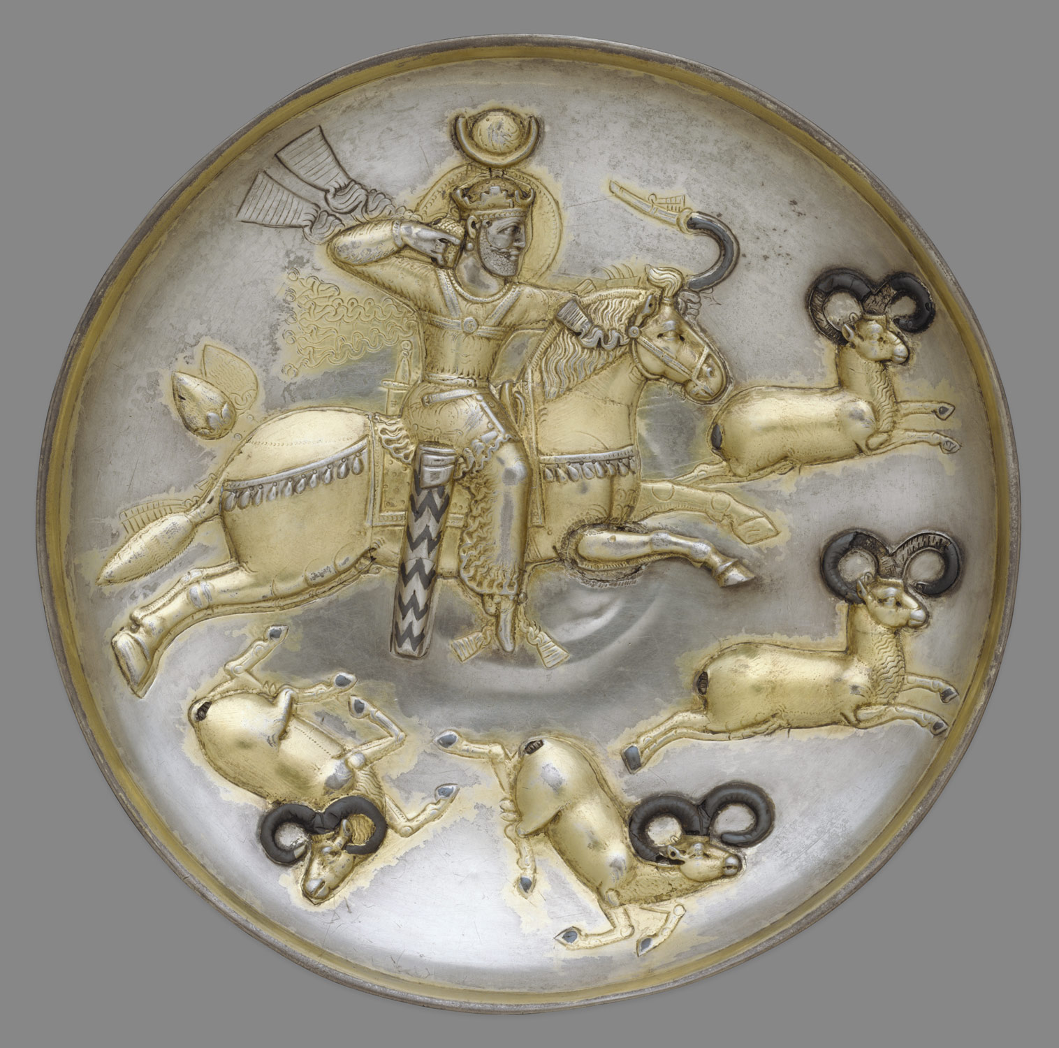 Plate with king hunting rams