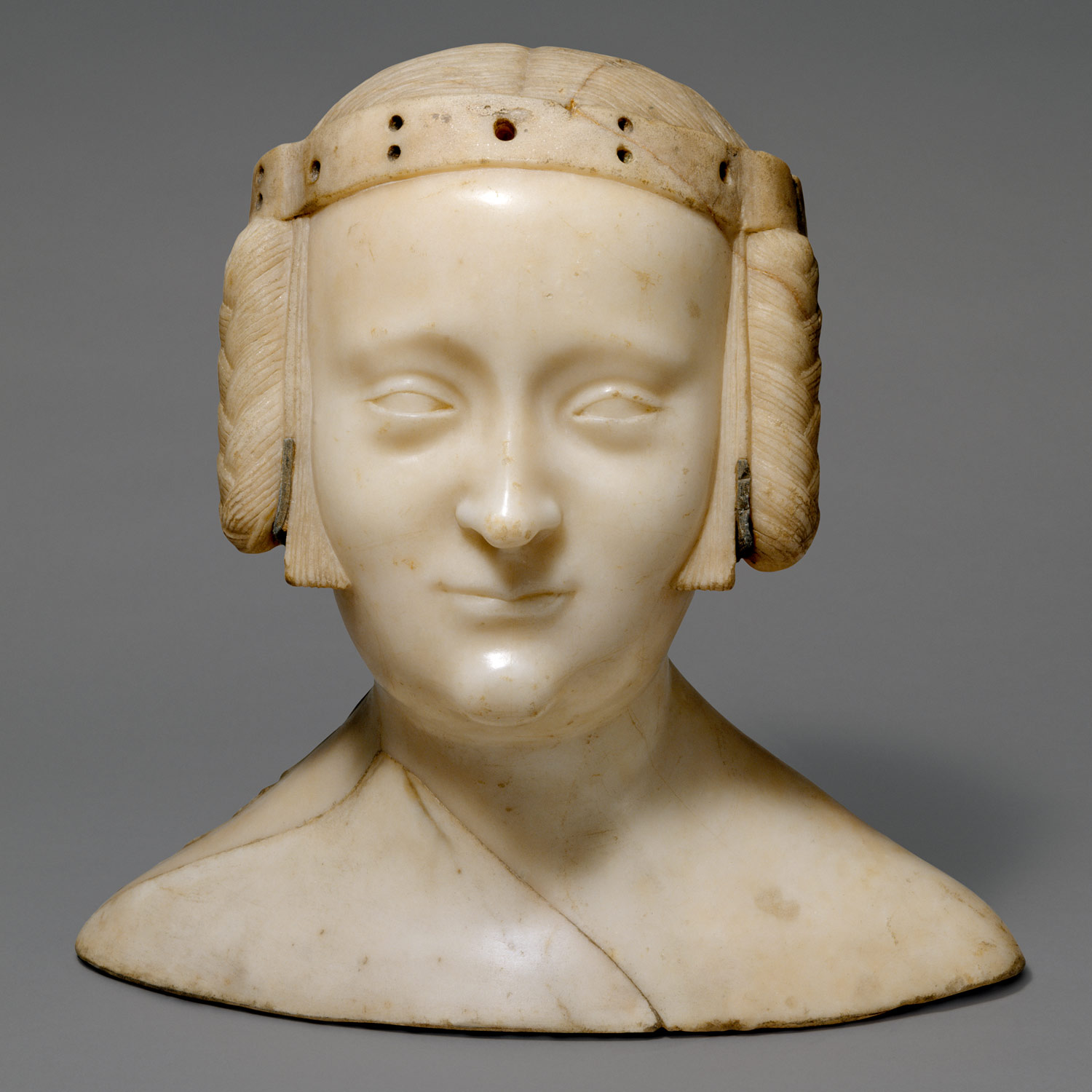 Carved marble bust of woman c. 1381